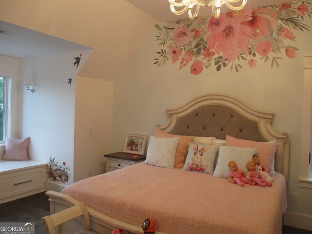 bedroom with an inviting chandelier