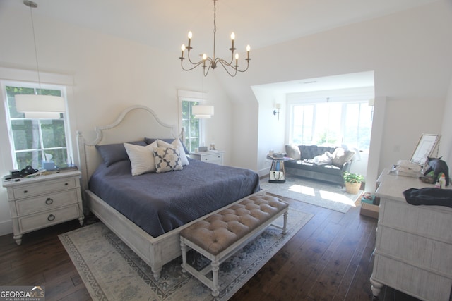 bedroom with an inviting chandelier, lofted ceiling, dark hardwood / wood-style flooring, and multiple windows