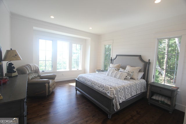 bedroom featuring dark hardwood / wood-style flooring