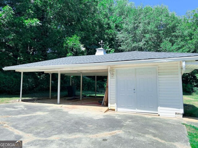 garage with a carport