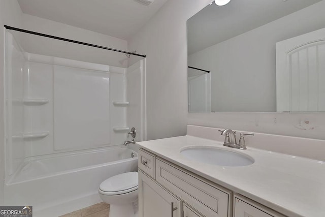 full bathroom featuring tile patterned floors, vanity, toilet, and shower / tub combination