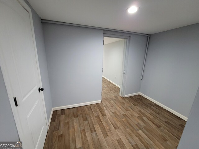 unfurnished room featuring light hardwood / wood-style flooring