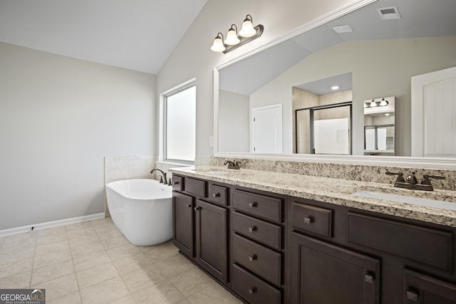 full bath featuring a sink, visible vents, and lofted ceiling