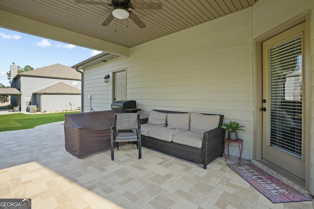 view of patio featuring outdoor lounge area and a ceiling fan