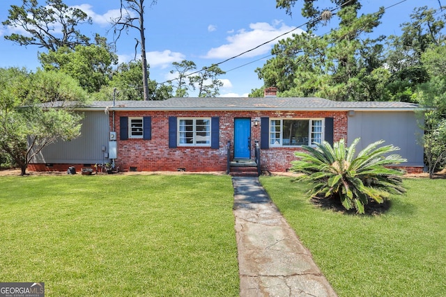 ranch-style home with a front lawn