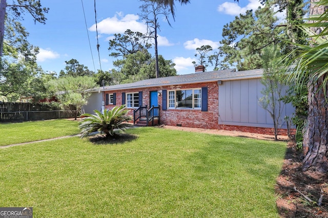 ranch-style house with a front yard