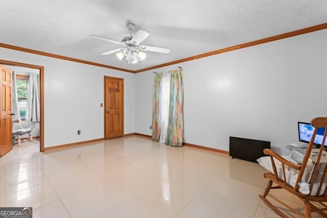 interior space with crown molding, a textured ceiling, light tile patterned flooring, and ceiling fan