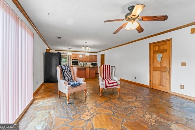 sitting room with ornamental molding and ceiling fan with notable chandelier