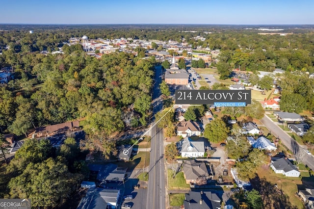 birds eye view of property with a residential view