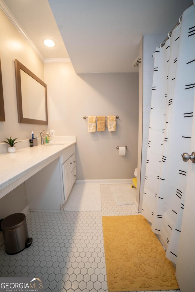 bathroom with crown molding, tile patterned flooring, vanity, and a shower with shower curtain