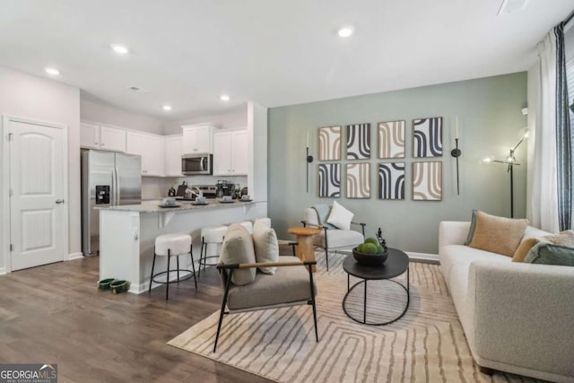 living room with hardwood / wood-style floors