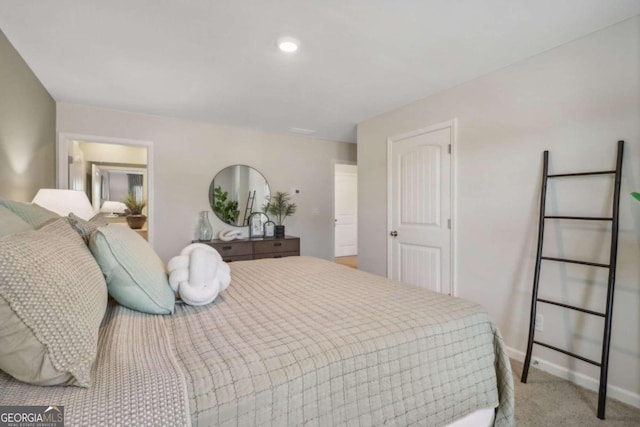 bedroom with light carpet