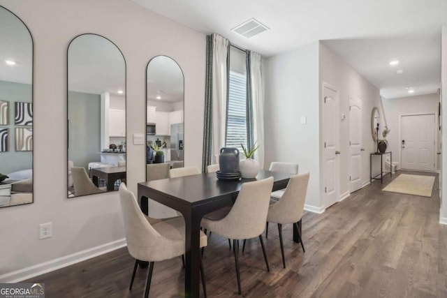 dining room featuring hardwood / wood-style flooring