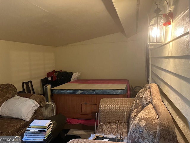 bedroom featuring vaulted ceiling