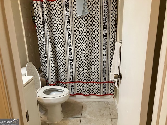 full bathroom with vanity, toilet, shower / bath combination with curtain, and tile patterned floors