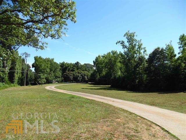 573 Lester Rd, Fayetteville, GA 30215 - view of community with a lawn