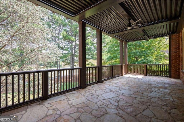 view of patio featuring ceiling fan