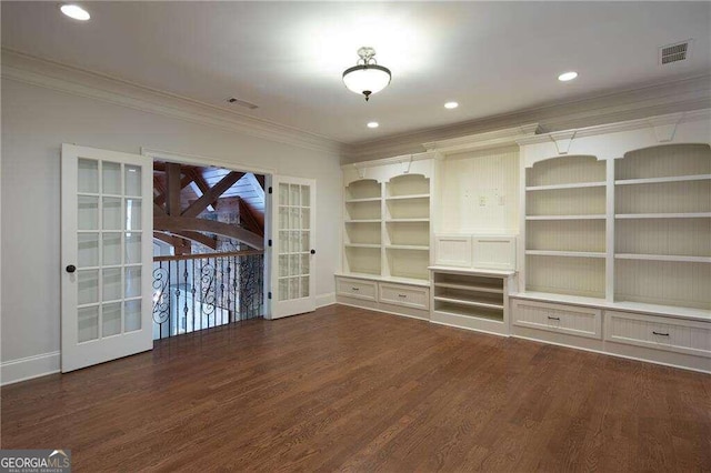 unfurnished living room with dark wood-type flooring, french doors, and ornamental molding