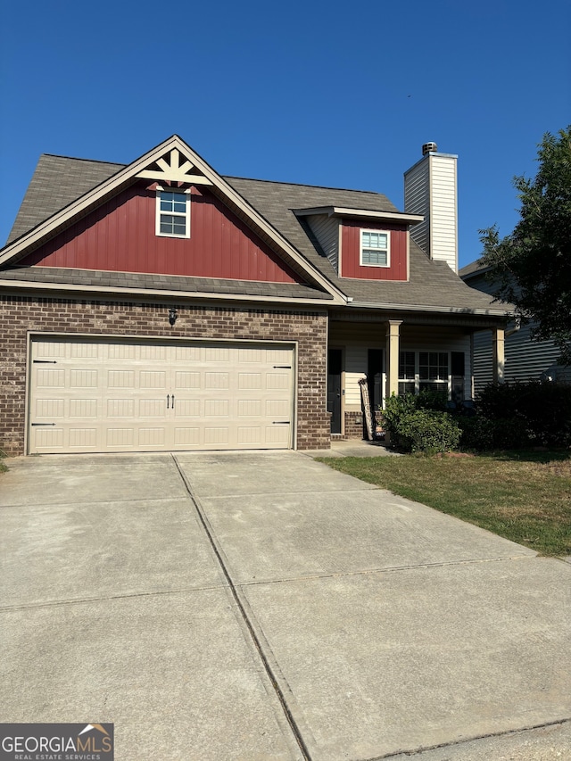 view of front of home with a garage