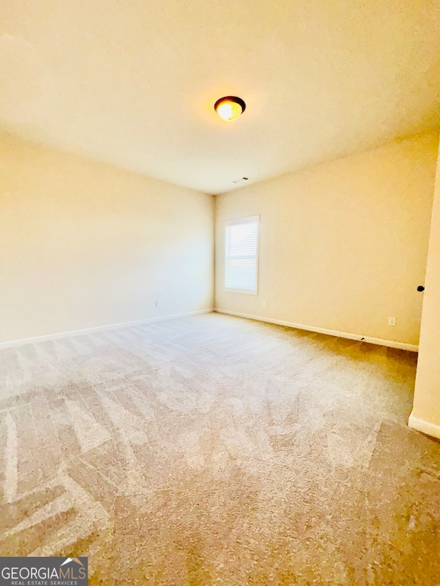 empty room with carpet floors