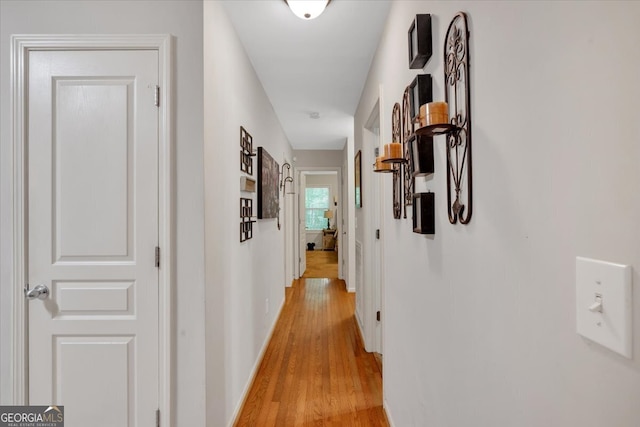 corridor featuring light wood-type flooring