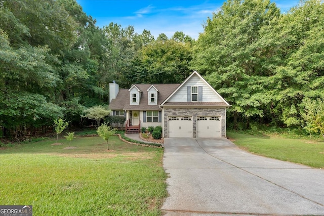 view of front of house featuring a garage and a front yard