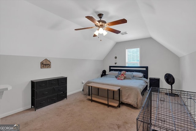 carpeted bedroom featuring lofted ceiling and ceiling fan