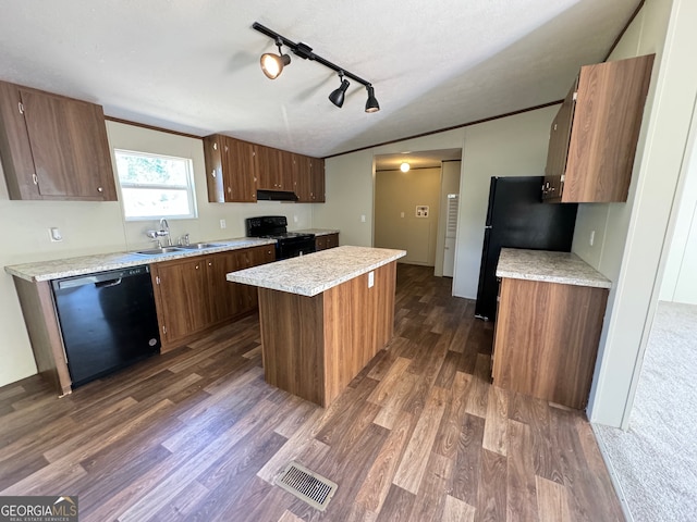 kitchen with range hood, sink, black appliances, dark wood-type flooring, and a kitchen island