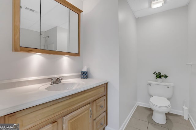 bathroom with walk in shower, tile patterned flooring, vanity, and toilet