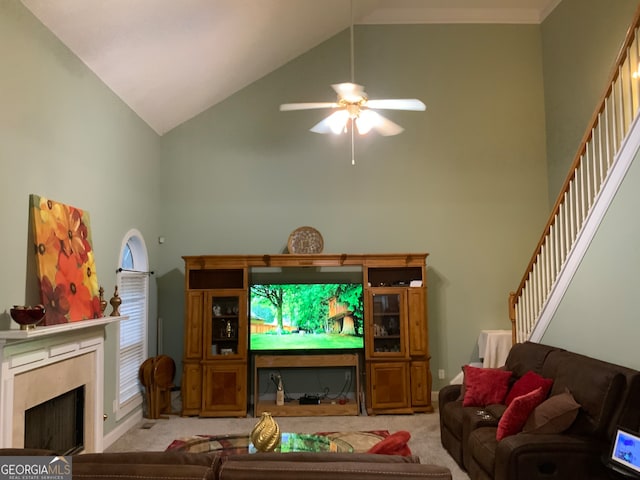 dining space with vaulted ceiling, ceiling fan, and crown molding