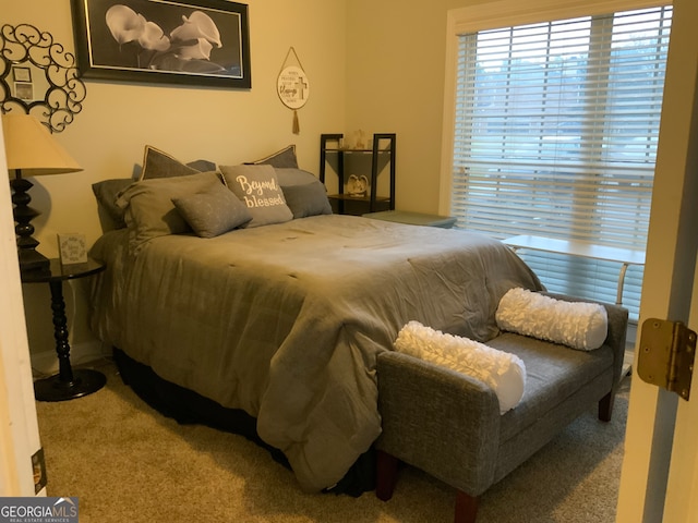 carpeted living room with ceiling fan, crown molding, and high vaulted ceiling