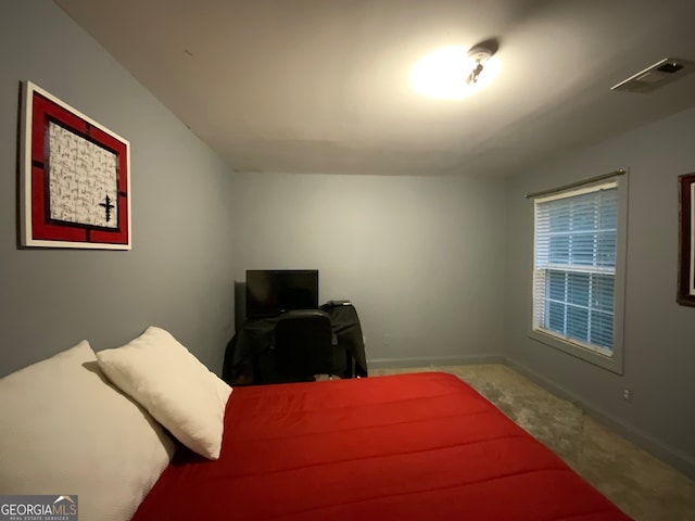 bedroom with ceiling fan, carpet flooring, a raised ceiling, and crown molding