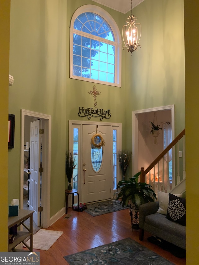 living room with carpet floors and ornamental molding