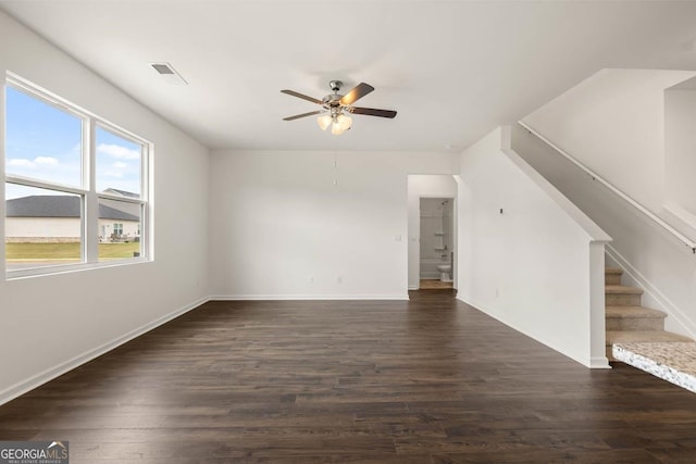 interior space featuring dark hardwood / wood-style flooring and ceiling fan