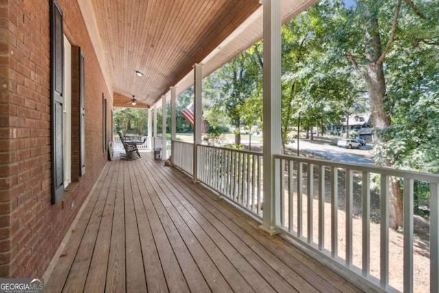 wooden terrace featuring a porch