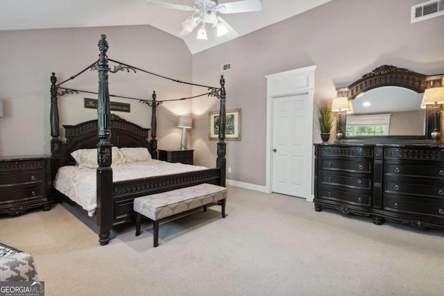 bedroom with visible vents, baseboards, carpet flooring, and vaulted ceiling