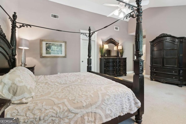 bedroom with visible vents, baseboards, carpet flooring, and vaulted ceiling