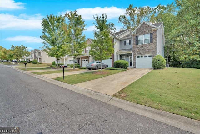 traditional-style home featuring a garage, stone siding, concrete driveway, a residential view, and a front lawn