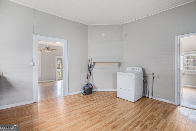 laundry area featuring washer / dryer, light hardwood / wood-style flooring, and ceiling fan