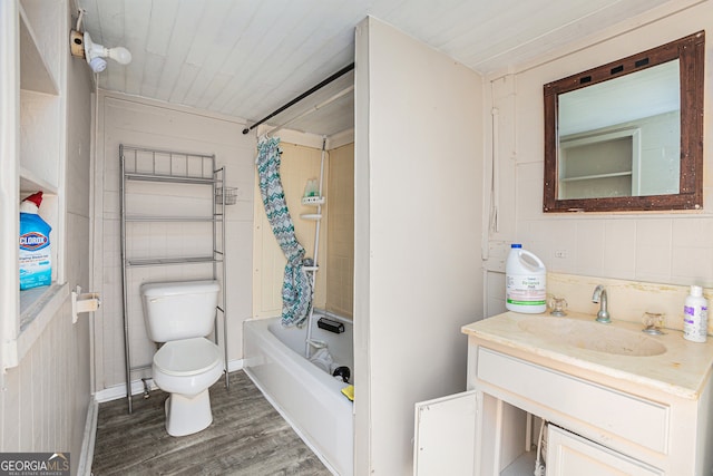 full bathroom featuring wooden ceiling, bathtub / shower combination, toilet, wood-type flooring, and vanity