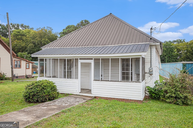 view of front of home with a front yard