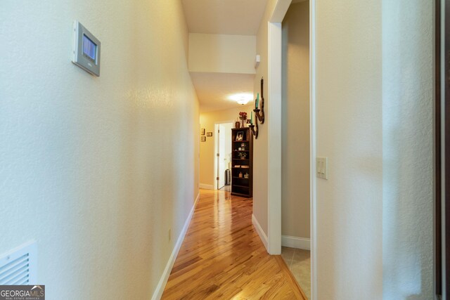 hallway featuring light hardwood / wood-style floors