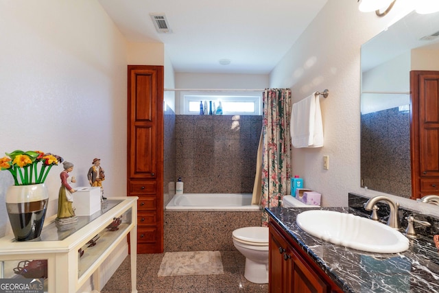 199 Colonsay Trce, Blairsville, GA 30512 - full bathroom featuring vanity, toilet, visible vents, and tiled shower / bath combo