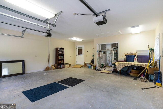 garage featuring a garage door opener