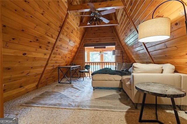 additional living space with lofted ceiling, carpet, wooden walls, and ceiling fan