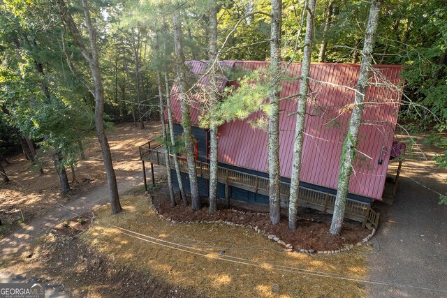 view of side of home featuring a deck