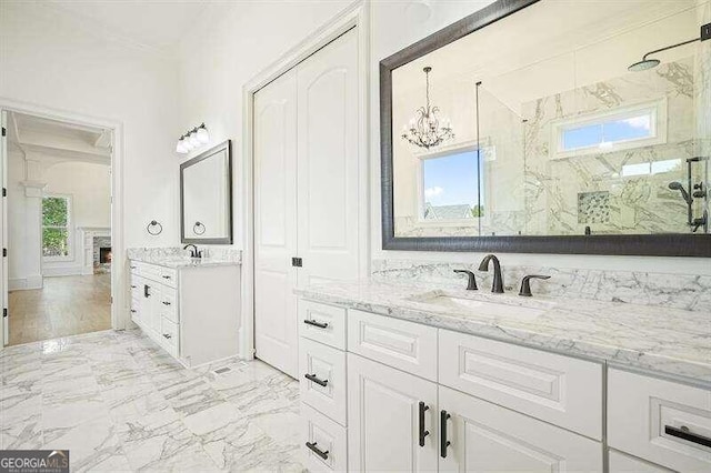 bathroom with vanity and walk in shower