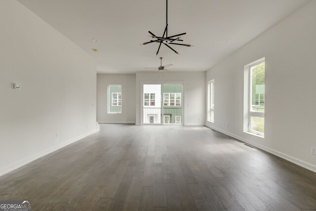 2029 Memorial Dr Unit 34, Atlanta, GA 30317 - unfurnished living room featuring dark wood finished floors, baseboards, and ceiling fan