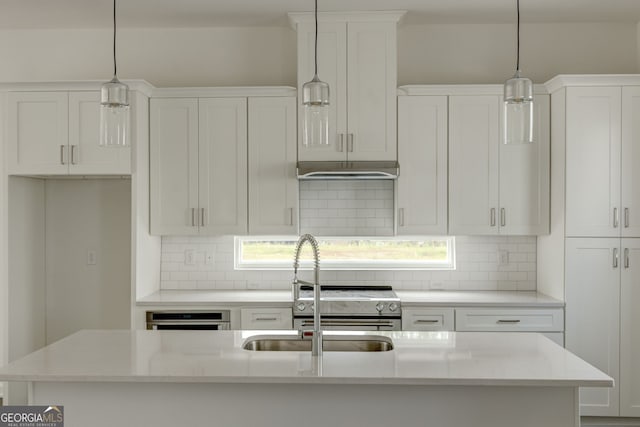 2029 Memorial Dr Unit 34, Atlanta, GA 30317 - kitchen featuring tasteful backsplash and white cabinets