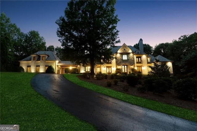 view of front of home featuring a yard